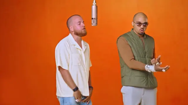 Friends Take the Mic: two performers in the orange studio