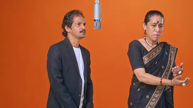 Family Duet: two performers in the orange studio